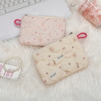 Vente en gros de sacs cosmétiques en coton matelassé floral mignon sac de rangement portable pour serviettes hygiéniques pour filles sac de maquillage doux dessin animé rouge à lèvres