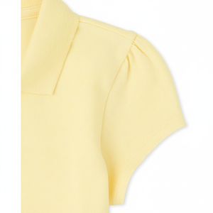 ชุดนักเรียนเสื้อโปโลสีเหลืองอ่อนผ้ายืดมีระบาย - Product Image 1