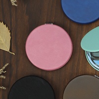 Miroir de poche en cuir PU de haute qualité de forme ronde, miroir compact en similicuir coloré portable, gravable au laser