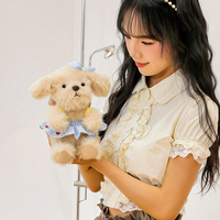 Peluche chien assis mignon avec robe à imprimé cœur, jouet en peluche doux pour filles, cadeau d'anniversaire pour enfants, décoration d'intérieur, vente en gros
