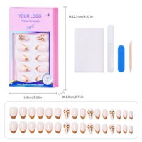 32 pièces Faux ongles à presser French blanc laiteux avec paillettes dorées, forme amande moyenne, avec accent nœud, couvrance totale, pour nail art DIY, OEM