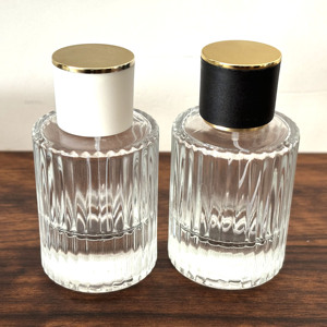 Hot Bán <span class=keywords><strong>30Ml</strong></span> Thủy Tinh Trong Suốt Chai Nước Hoa <span class=keywords><strong>50Ml</strong></span> Dọc Sọc Dày Dưới Nước Hoa Thủy Tinh Phun Biểu Tượng Tùy Chỉnh Hộp - Product Image 1