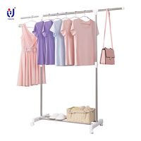 Vente en gros en usine Séchoir à vêtements pliable moderne en métal pour chevaux à bas prix Organisateur de balcon 2 ailes à double niveau pour garde-robe