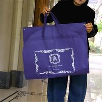 Housse de vêtement de voyage pliable réutilisable en non-tissé avec poignées, personnalisable avec logo, pour vente en gros