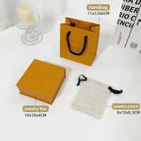 Boîte à bijoux en carton brun de haute qualité, personnalisable, faible MOQ, avec sac en papier et pochette à bijoux, pour boutique.