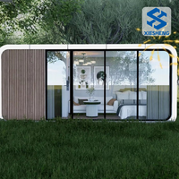 Dalian Petite cabine préfabriquée mobile moderne personnalisée de 20 pieds 40 pieds pour la maison, le bureau, les immeubles de bureaux, les magasins et le panneau sandwich