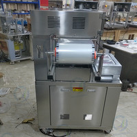 Machine à sceller entièrement automatique pour la conservation de l'air conditionné Machine pneumatique à sceller et à emballer à une sortie à quatre boîtes