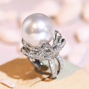 Bague à nœud en fausses perles pour femmes, bijoux élégants et chics pour les doigts - Product Image 1