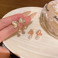 Boucles d'oreilles pendantes RINHOO tendance, ailes de papillon, imitation perle champagne, strass exquis, bijoux mignons pour soirée