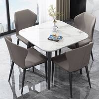 Ensemble table et chaises de salle à manger en pierre frittée et métal de luxe pour usage hôtelier, design moderne, durable, petit format