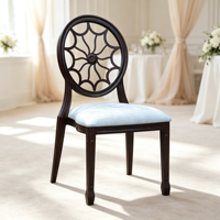 Chaise de salle à manger Louis noire vintage, empilable, durable, à dossier rond évidé, aspect bois, en aluminium, pour mariage