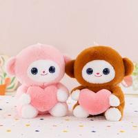 Venta al por mayor de lindos peluches de mono de dibujos animados en rosa y marrón con corazón rosa, suaves, de 8 pulgadas, para máquina de garras