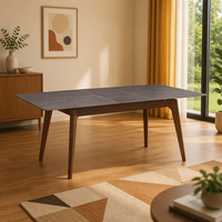 Table à manger extensible en pierre frittée avec pieds en bois massif