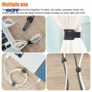 50 قطعة من منظم الكابلات ولفافات الأسلاك القابلة لإعادة الاستخدام، أربطة وحلقات لإدارة كابلات الفأرة وسماعات الأذن والبيانات للمنزل والمكتب - Product Image 4