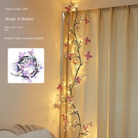 Fleurs artificielles de lumière de rotin de papillon de LED romantique pour le modèle de mur de chambre à coucher de décoration intérieure avec la disposition de simulation de branche