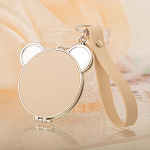 <b>Cute</b> <b>Bear</b> Head Shaped PU Leather Compact Mirror with Keychain Double Sided Folding Travel Mirror With Plastic Frame Strap - Product Image 3