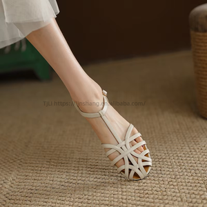 Nuevas sandalias planas en forma de T para mujer, estilo romano, con diseño hueco y lazo, venta al por mayor de fábrica, tendencia de moda, plataforma transpirable. - Product Image 2