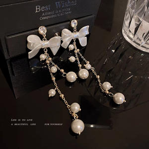 2025 <b>Fashion</b> New Arrival Butterfly Knot Tassel <b>Drop</b> <b>Earrings</b> White Water Pearl & Alloy Gold Plated Women's Party Trendy - Product Image 3