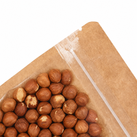 Sac en papier kraft brun en stock, pochette debout avec fermeture éclair sur le dessus et face avant transparente pour l'emballage des noix, des céréales et des fruits secs