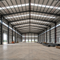 Edificio Prefabricado Moderno de Estructura de Acero Ligero, Viga de Acero Sólida en Forma de H, Techo de Panel Sándwich para Almacén