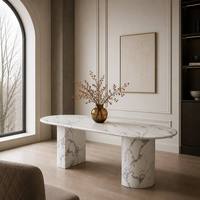 Table de salle à manger ovale moderne en pierre avec plateau en marbre artificiel finition mate, base à deux pieds, pour usage domestique et hôtelier, personnalisable