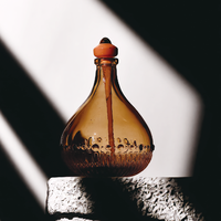 Flacons de parfum en verre vides de luxe sur mesure, formes variées, 50ml-400ml, surface ambre dorée dégradée, multi-impression, prêts à l'emploi