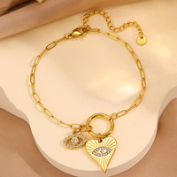 Chaîne longue à fermoir tendance pour femme, bijoux de couple en forme de cœur et œil de démon. Bracelet en acier inoxydable. Vente en gros d'usine.
