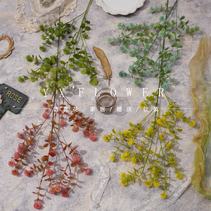 Branche de fleur artificielle Yixuan 30cm-100cm en plastique pour décoration intérieure et mariage - Product Image 1