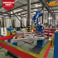 Station de soudage robotisée économique, système de soudage automatique continu pour la production de palettes métalliques
