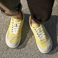 Chaussures d'entraînement allemandes à coupe large pour couples – Baskets tendance en polyuréthane avec semelles souples et amortissantes ; Décontractées pour hommes et femmes