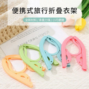 ราวแขวนผ้าพับได้ พลาสติกแบบพกพา ดีไซน์ปีกนก สำหรับการเดินทาง ใช้กลางแจ้งในหอพัก ราวตากผ้ากันลม - Product Image 1