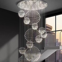 Lustre contemporain OEM à longs pendentifs en cristal pour hall d'entrée, salon, duplex, loft et escalier