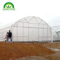 Serres agricoles professionnelles Tunnel en plastique pour fermes de tomates Kit complet de serre avec système d'irrigation