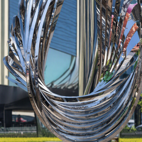 Sculpture en métal poli miroir personnalisée BLVE, art abstrait en acier inoxydable en forme de vague pour la décoration d'entrée d'hôtel ou de place publique