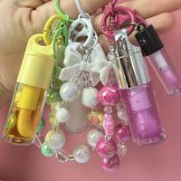 Nouvel ensemble avec tube échantillon, huile à lèvres hydratante et repulpante aux fruits, changeant de couleur, longue tenue, non collante, avec bracelet