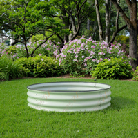 Jardinière ronde surélevée en métal durable de luxe moderne, auto-arrosante, avec support, revêtement PE, pour usage extérieur et hôtelier