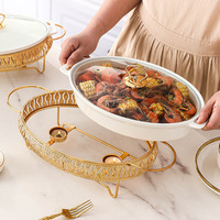 Vente en gros Casserole personnalisée de forme ovale dorée Chauffe-soupe durable de luxe Pot à soupe en céramique marbrée