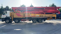 Camion pompe à béton San-y C10 d'occasion, flèche de 62 m, châssis spécial Sany, 348 kW, 54 tonnes, pour le coulage de béton dans les bâtiments de grande hauteur
