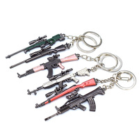 Vente en gros d'armes chaudes Vendre une gamme complète d'armes à feu Modèles d'armes Artisanat en métal Porte-clés Pendentifs Jouets pour enfants