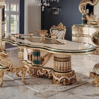 Ensemble de table et de chaises de salle à manger de luxe européenne rectangulaire en bois massif avec feuille d'or noble française pour meubles de villa