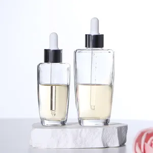 50ml 100ml卸売透明高級オイル包装ガラスドロッパーボトルシルバーキャップ付き