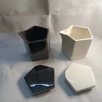Pot à bougie de massage en céramique noire avec bec verseur