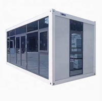 Maison conteneur préfabriquée modulaire en acier de 20 pieds avec mur rideau en verre pour bureau, studio, jardin, extérieur