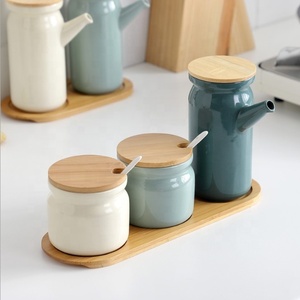 Barattolo di archiviazione con coperchio di bambù per il tubo a forma di barattolo di archiviazione di <span class=keywords><strong>ceramica</strong></span> per barattolo di <span class=keywords><strong>spezie</strong></span> con cremagliera in legno - Product Image 1