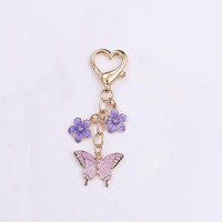 Porte-clés en métal coloré avec breloque papillon, cœur et fleur, fermoir mousqueton, cadeau, vente en gros