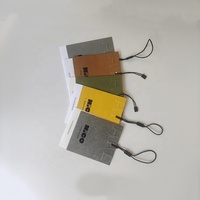 Étiquettes en papier de coton étiquettes de vêtements personnalisés haut de gamme étiquettes en Stock robe de mariée universelle bagages étiquette volante
