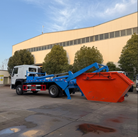 Camion benne basculante Sinotruck Howo 6X4 robuste de 10 000 litres avec bennes à déchets à bras oscillant à vendre