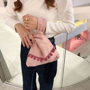 กระเป๋าใส่เหรียญสไตล์เกาหลี กระเป๋าใส่เหรียญพู่ห้อย สไตล์ญี่ปุ่น กระเป๋าคล้องมือแบบผูกปม 23x31 ซม. สำหรับการช้อปปิ้ง หลายสี - Product Image 3