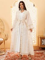 Robe musulmane luxueuse de couleur unie, robe boutonnée tendance, cardigan de style moyen-oriental pour femmes