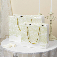 Sac de shopping en papier élégant avec imprimé papillon en dentelle, logo personnalisé pour boutique, salon de beauté, sac papier, boîte cadeau